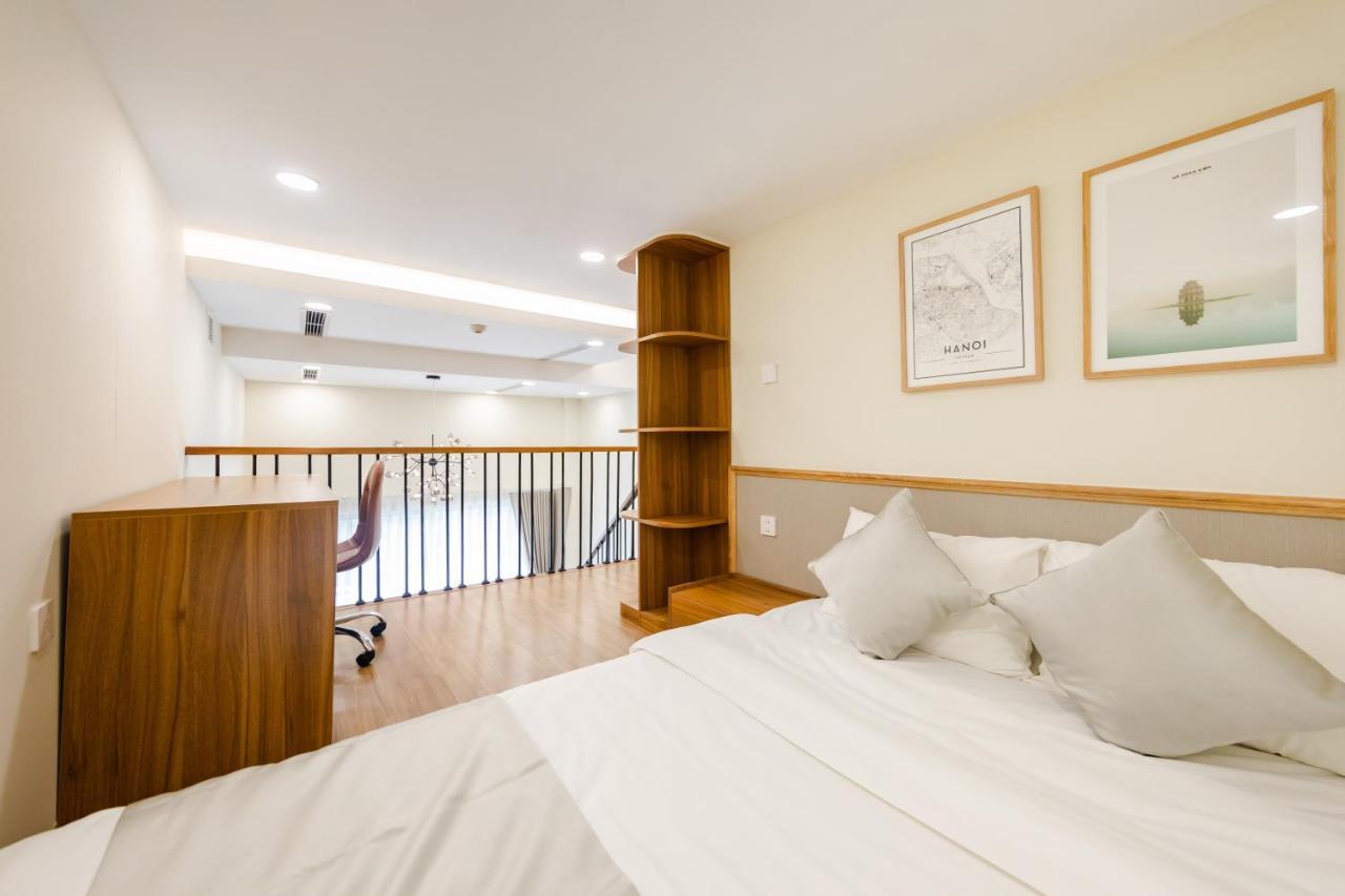 Five Star Westlake 1St-4Th Floors Hotel & Serviced Apartment Hanoj Exteriér fotografie A bedroom in a serviced apartment in Singapore